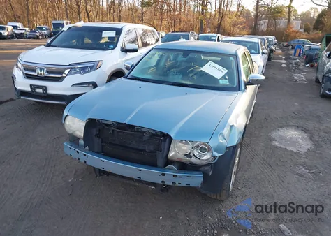 2009 Chrysler 300 Limited z USA, uszkodzony, nr VIN 2C3KA33V69H543994